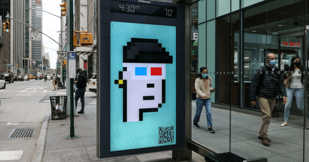 picture of a cryptopunk being displayed at a bus stop