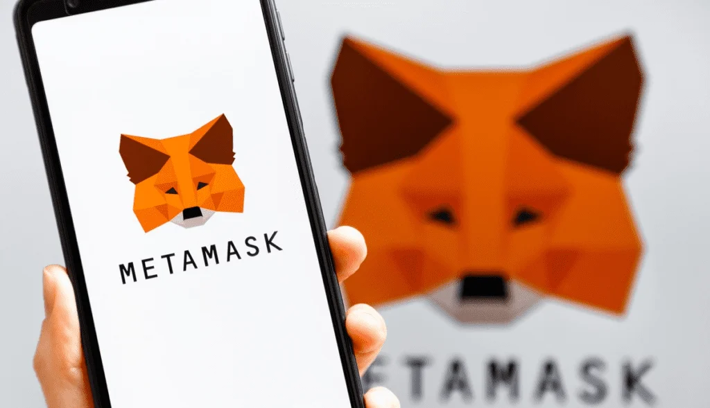 A phone with the MetaMask logo