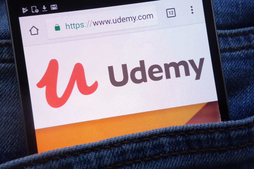 Udemy logo on a smartphone